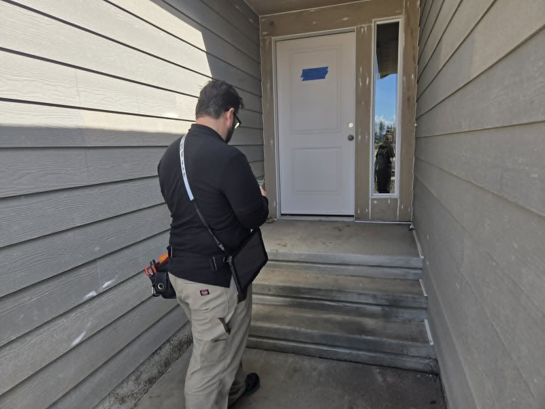Athol home inspector Bryan Harris inspecting a North Idaho property